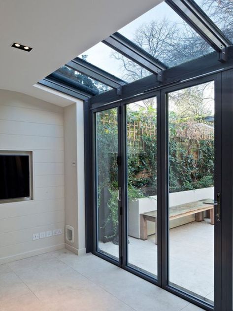 There's a little cat flap in the wall by the glass doors #patio #patio #roof Terrasse Med Tak, Patio Lighting Diy, Garden Room Extensions, House Extension Plans, Building A Porch, Room Extensions, Glass Extension, Farmhouse Doors, House Extension Design