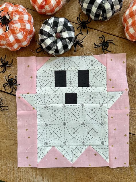 This is a digital pattern. Upon purchase Etsy will generate a link to download. Nothing will be emailed to you.  This adorable little Ghost Block is perfect for Halloween quilting! It is the exact size to use in my Scaredy Cat Quilt Pattern (sold separately). It finishes at 9" x 9". This pattern is for the Ghost Block only. The quilt shown is called Scaredy Cat and the Ghost Block is meant to interchange into the pattern. Instructions are included in this block. Fabric Requirements for 1 block: 1 - 10" x 10" precut square or equivalent white/cream for ghost 1 - 10" x 10" precut square or equivalent pink for background scrap of black fabric for eyes and nose Small Quilt Blocks, Quilted Pillow Cover Pattern, Ghost Quilt Block, Halloween Barn Quilt, Ghost Quilt Block Pattern Free, Halloween Quilt Blocks, Halloween Quilts Ideas, Little Ghost Quilt Pattern, Quilt Ghost