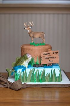 Hunting and fishing cake Fishing Cake Ideas, Hunting Birthday Cakes, Deer Hunting Birthday, Hunting Birthday Party, Fish Cake Birthday, Fishing Cake, Hunting Cake, Happy 27th Birthday, Hunting Birthday