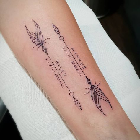 Image may contain: one or more people Dates Of Birth Tattoos Ideas, Arrow Date Tattoo Ideas, Roman Numeral Tattoo With Arrow, Arrow Date Tattoo, Arrow Tattoo With Date, Arrow Tattoo With Roman Numerals, Arrow With Date Tattoo, Arrow Script Tattoo, Roman Numeral Arrow Tattoo