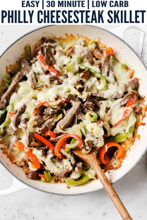 This garlicky philly cheesesteak skillet has all the classic flavors with half the carbs! Filled with tender bell peppers, onions, mushrooms, steak and melty mozzarella for the perfect weeknight dinner! It's a one-pan recipe that's ready in 30 minutes! #lowcarb #phillycheesesteak #onepanmeal #skilletmeal #easydinnerideas #steakrecipes Philly Cheesesteak Skillet, Cheesesteak Skillet, Steak Skillet, Steak Mushrooms, Meal List, Skillet Steak, Cheesesteak Stuffed Peppers, Philly Cheese Steak Recipe, Philly Steak