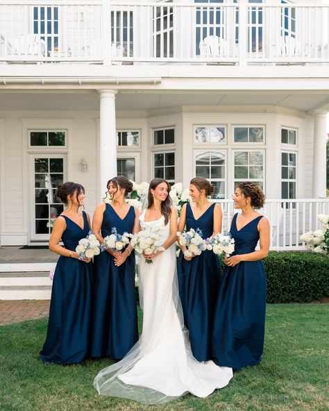 One last gorgeous summer hurrah on the harbor 🌊 Katherine’s bridesmaids wore our Navy Shantung Harper dress with the Dahlia skirt to create an especially elegant look, fitting for such a timeless celebration. Classic brides, save this one for bridal party/all-white bouquet/invitation suite inspiration! Congratulations to the newlyweds, Katherine and Jack! 🥂 Planning @elsilueventplanning Photography @jessicavandermarelphoto Videography erickdavid.films Florals @florarae_ Hair @balayage_bybroo... Navy Blue Bridal Party, Navy Bridal Party, Navy Bridesmaids Dresses, Navy Bridal Parties, Dark Blue Bridesmaid Dresses, Navy Blue Wedding Theme, Summer Bridesmaids, Navy Blue Bridesmaids, Navy Bridesmaids