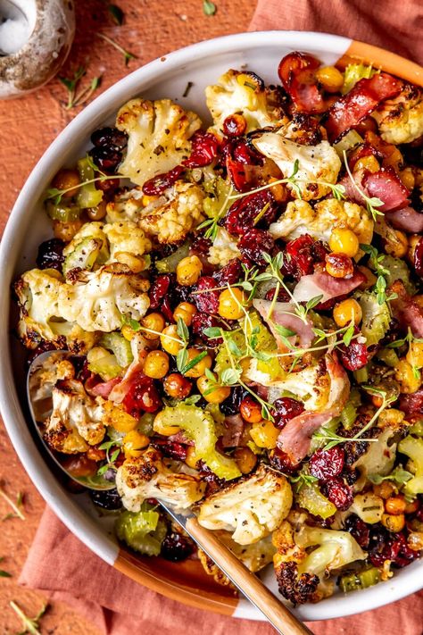 HERB AND MAPLE ROASTED CAULIFLOWER WITH CHICKPEAS Roasted Chickpeas Meal, Roasted Vegetable Dinner Ideas, Thanksgiving Chickpea Recipes, Spiced Cauliflower And Chickpeas, Chopped Cauliflower Recipes, Veggie Fall Recipes, Chickpea Thanksgiving Recipes, Herb And Maple Roasted Cauliflower, Cauliflower And Beans Recipe