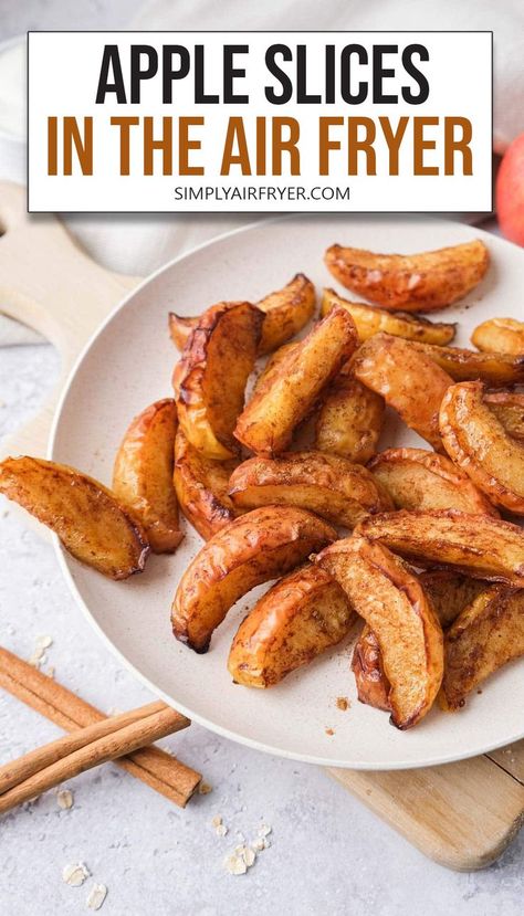 cooked and slightly crispy apple slices on white plate with text overlay "apple slices in the air fryer". Cooking Apple Recipes, Baked Apple Slices, Apple Slice Recipe, Air Fry Recipes, Fried Apples, Slice Of Heaven, Cooked Apples, Slices Recipes, Air Fryer Healthy