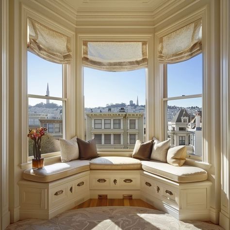 A cozy window seat with a built-in bookshelf offers a perfect nook for reading while enjoying panoramic city views Bay Window Seat Design, Bay Window Seats, Bay Window Seat Ideas, Reading Nook Window Seat, Reading Nook Window, Cozy Window Seat, Aesthetic Elements, Bay Window Seat, Window Seat Design