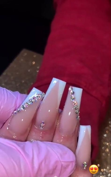 Plain White Acrylic Nails With Gems, White 18th Birthday Nails, Nail Designs Diamonds Rhinestones, French Nail With Diamonds, V Shaped French Tip Nails With Gems, White Long Nails With Gems, White And Rhinestone Nails, Long Pink Acrylic Nails With Rhinestones, Prom Nails Diamonds