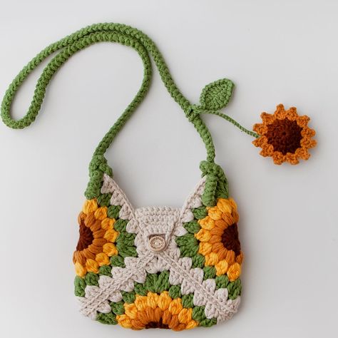 🌻Hand crochet sunflower design bags for little ones you can chose from two different colors 🌻#crochetbags #croche #handmade #crochetbag #crochetaddict #crochetersofinstagram #bags #handmadebag #bag #handmadebags #crocheting #crochetlove #knitting #m #crochetlover #handmadewithlove #eastergifts #kidsclothes #childrenhandbags #farkl #bagsforkids #crochetinspiration Sunflower Purse Crochet, Sunflower Crochet Projects, Chroching Beginners, Sunflower Bag Crochet, Easy Crochet Purse, Sunflower Crochet Bag, Crochet Sunflower Bag, Flower Crochet Bag, Knitting Yarn Diy