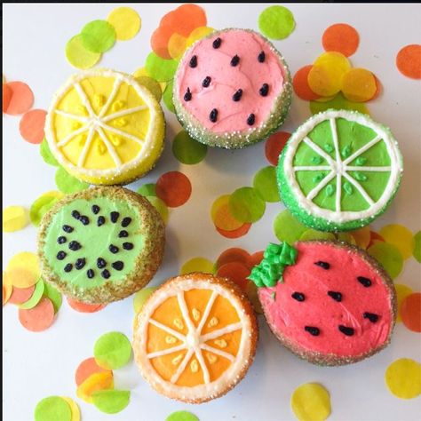 Fruit-themed cupcakes! Trophy Cupcakes in Seattle are delicious!    https://www.trophycupcakes.com/ Fruit Inspired Cupcakes, Tutti Fruity Cupcakes, Twotti Fruity Cupcake Ideas, Two Tii Fruit Birthday Theme, Fruit Birthday Cupcakes, Twotti Fruity Birthday Cupcakes, Tutti Frutti Cupcakes, Cupcake Fruit Decoration, Food Themed Cupcakes