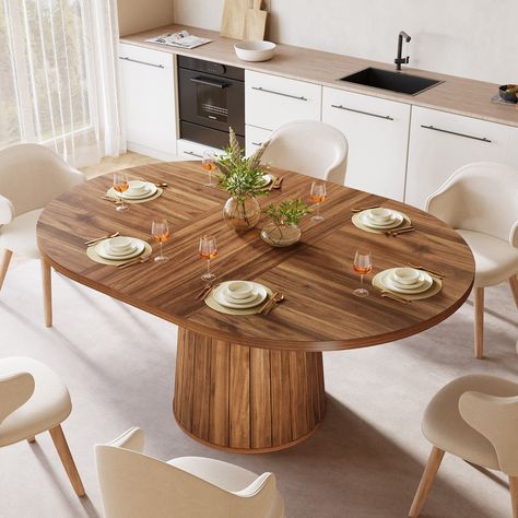 Oval Shape - This dining table sports an elegant oval design which brings a dash of sophistication to your dining room. The unique shape not only provides a visually striking centerpiece but also heightens the seating capacity for comfortable meals with loved ones. Sturdy Build - Constructed with premier wood, this kitchen table is designed for longevity. The robust wooden base allows for an impressive degree of stability and support, ensuring the table lasts for numerous years. With its warm br Oval Wooden Dining Room Table, Modern Rustic Dining Table Oval, Large Oval Wood Dining Table, Oval Dinner Table, Diset Wood Oval Extendable Dining Table, Kitchen Dinner Table, Oval Kitchen Table, 59” X 28” Table Oval Dining, Kitchen Dinner