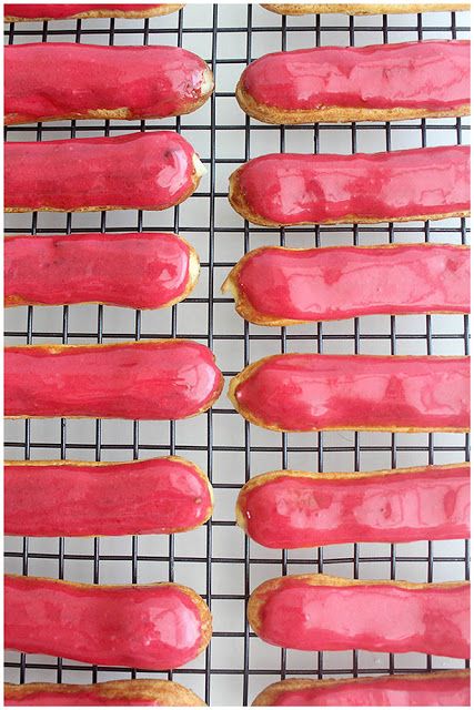 Foodagraphy. By Chelle.: Vanilla Bean Eclairs with Raspberry Glaze Raspberry Eclairs, Foodie Desserts, Eclair Cream, Eclairs Dessert, Raspberry Glaze, Whipped Cream Desserts, Swiss Rolls, Eclair Recipe, Bakery Items