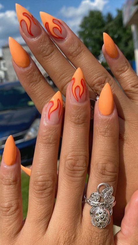 Orange flame nails Orange Flames Nails, Orange Flame Acrylic Nails, Flame Nails Orange, Summer Flame Nails, Orange Flame Nail Designs, Fire Nails Orange, Fire Inspired Nails, Download Festival Nails, Black Flame Nail Art