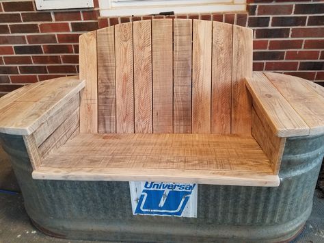 My husband Daniel built this bench using an old metal watering trough.  #rustic #rusticbench #diy Water Trough Bench Seat, Water Trough Furniture, Water Trough Bench, Old Water Trough Ideas, Ffa Projects Ideas, Stock Tank Bench, Water Trough Ideas, Metal Water Trough, Ice Trough