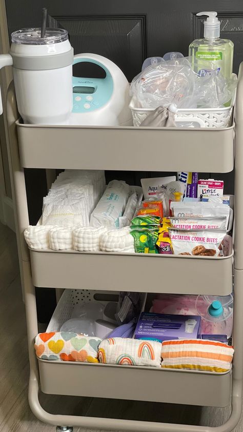 Jenn Muñoz | Third trimester and I’m in full nesting mode. 😁 Finished my breastfeeding/mommy cart to make those late nights and pumping sessions easier … | Instagram Bedside Pumping Station, Breast Feeding Station Organization, Pumping Station Cart, Bedside Cart For Newborn, Pumping Cart Ideas, Nursing Cart Organization, Post Partum Caddy, Postpartum Cart Bedside, Postpartum Bedside Cart