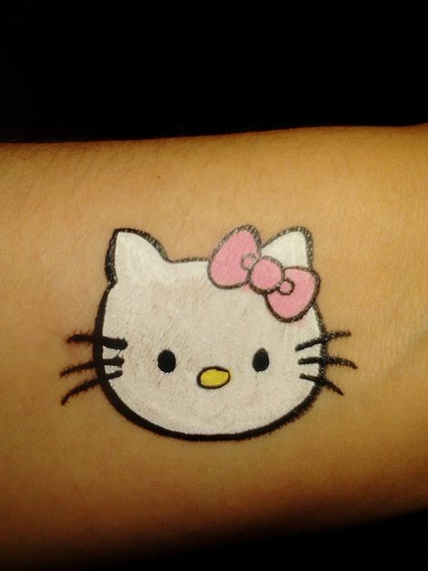 Hello Kitty | Flickr - Photo Sharing! Drawing On Face For Kids, Hello Kitty Face Paint, Face Painting Images, Kitty Face Paint, Cheek Art, Leg Painting, Girl Face Painting, Hello Kitty Tattoos, Hello Kitty Themes