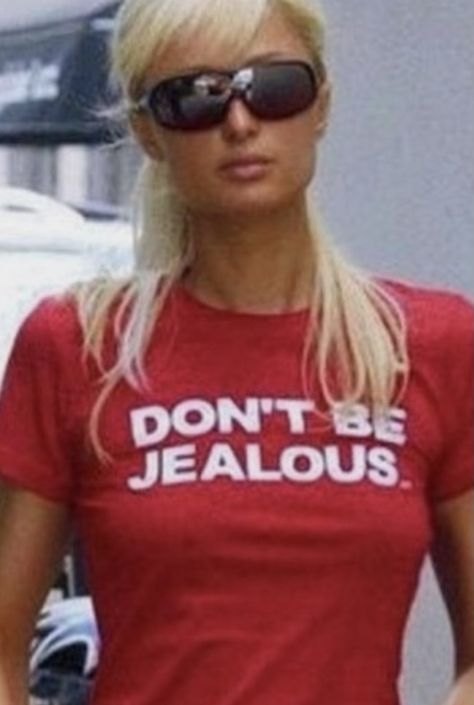 Paris Hilton Early 2000s, Dont Be Jealous, Iconic Tees, Don't Be Jealous, Corporate Job, Early 2000s Fashion, Slogan Shirts, Y2k Tops, Baby Tees