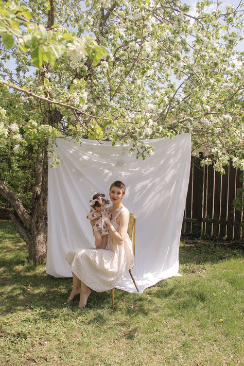 Apple blossoms, white sheet backdrop, mom and daughter, photoshoot Sheet Backdrop Photography Outside, Diy Outdoor Photoshoot, Outdoor Sheet Photoshoot, Sheet Backdrop Photography, Outdoor Photo Backdrop, White Sheet Backdrop, Birth Photography Tips, Mom And Daughter Photoshoot, White Sheet Photoshoot