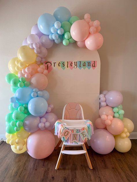 Disneyland Birthday Backdrop, Disneyland Birthday Party Food, Disney Themed First Birthday Girl, Disney First Birthday Girl, Disneyland First Birthday, High Chair Decorations 1st Birthday, Disneyland Birthday Party Theme, First Birthday Balloon Arch, Fairy Theme Birthday Party