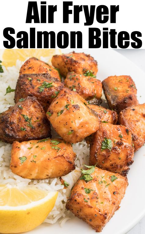 A white dinner plate with 1" cubed salmon bites, white rice, and lemon slices. Text at the top reads "air fryer salmon bites". Salmon Nuggets Air Fryer, Salmon Nuggets, Asian Steak Bites, Air Fryer Salmon, Salmon Bites, Frozen Salmon, Garlic Cream Sauce, Delicious Seafood Recipes, Drink Inspiration