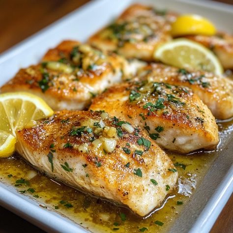 Perfectly Baked Lemon Garlic Butter Fish Lemon Garlic Butter Fish Recipes, Lemon Butter Mahi Mahi, Lemon Picatta Fish, Lemon Garlic Cod Recipes, Baked Halibut With Lemon Butter Sauce, Lemon Butter Garlic Fish, Cod With Lemon Butter Sauce, Baked Striper Fish Recipes, Garlic Butter Fish Recipes