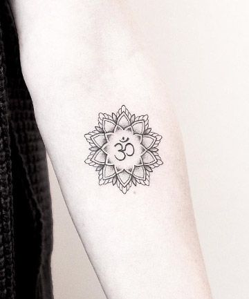 17 Mandala Tattoo Designs to Help Channel Your Inner Warrior Princess Mandala Om Tattoo, Om Tattoo Designs, Tattoo Designs Mandala, Mandala Arm, Mandala Arm Tattoo, Ohm Tattoo, Om Symbol Tattoo, Mandala Arm Tattoos, Mandala Tattoo Meaning