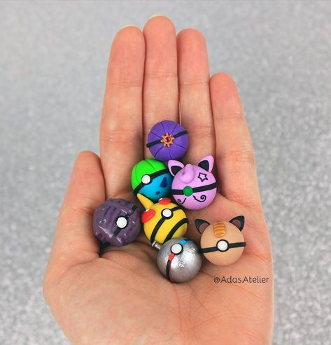 I turned some Pokémon into Pokéballs! Do you recognise which ones? You can watch the filming process on my channel. #pokemon #pokeballs #ashketchum #polymerclay #craft #fimo #miniature #sculpting Polymer Clay Pokemon Easy, Clay Art Pokemon, Pokemon Lamp, Pokemon Polymer Clay, Polymer Clay Pokemon, Miniature Sculpting, Pokemon Clay, Pokemon Earrings, Clay Pokemon