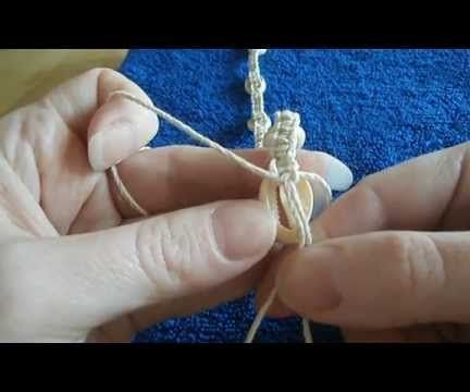 A video tutorial on how to incorporate cowrie shells into your hemp necklace, choker, bracelet, or anklet. Easily make a cowrie shell hemp necklace with this... How To Make A Cowrie Shell Bracelet, Seashell Necklace Diy, Macrame Basics, Shell Necklace Diy, Crochet Bracelet Tutorial, Hemp Macrame, Cowrie Shell Jewelry, Macrame Necklaces, Cowrie Shell Necklace