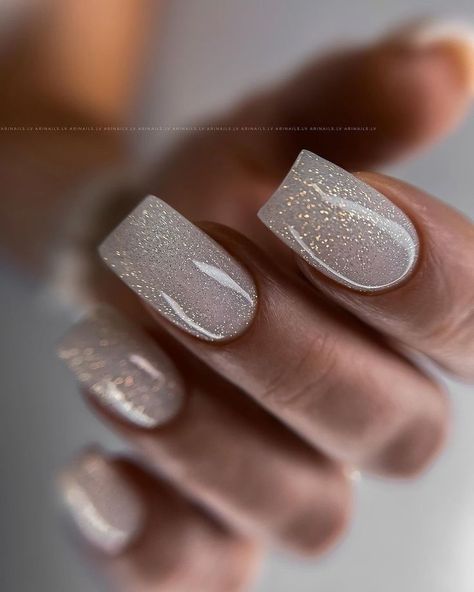 19 Gorgeous Winter Gel Nail Colors for 2023-2024 - thepinkgoose.com Nye Nails Glitter, Christmas Party Nails Sparkle, Nye Nails Dip, Winter Gel Nail Colors, Neutral Colored Nails, Nye Nails 2022, Nye Nails Short, Nye Nails, Nail Colors Winter