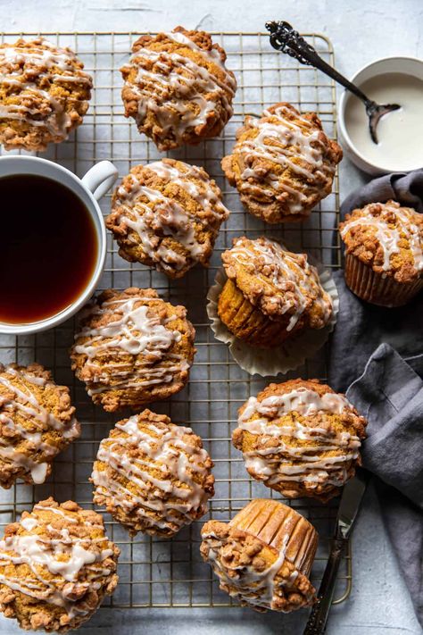 These pumpkin coffee cake muffins taste just like coffee cake but with a pumpkin spin! The muffin is tender, full of pumpkin spice and has a sweet crumb topping and icing drizzle. The perfect pairing to a cup of your favorite coffee. Pumpkin Crumb Muffins, Pumpkin Coffee Cake Muffins, Breakfast Pumpkin Muffins, Pumpkin Crumble Muffins, Autumn Muffins, Icing Drizzle, Autumn Desserts, Fall Muffins, Pumpkin Coffee Cake