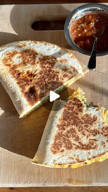 Arshena Inshan on Instagram: "Never enough time on a weekday for a satisfying breakfast? That’s where this quesadilla comes in! Use any veggies you have in your fridge and this will become an easy staple. 

Breakfast Quesadilla

Heat a 10” nonstick skillet over medium low heat with cooking spray. 
Add 2-3 beaten eggs and light salt & pepper. 
Sprinkle on your preferred toppings. I added jalapeños, onions, and tomatoes. 
Sprinkle on some shredded cheese. 
Place an extra large (preferred) or large tortilla on top bs gently press down. 
Cover and cook until eggs are set, about 3-4 minutes. 
Flip and fold one half over the other. Toast until desired doneness. 
Flip and toast the other side. 
Serve either salsa. 

#breakfastquesadilla #quesadilla #breakfastlover #foodreels #breakfastwrap #break Folding Quesadillas, Folded Quesadilla, Onions And Tomatoes, Breakfast Quesadilla, Breakfast Wraps, Breakfast Lovers, Cooking Spray, Nonstick Skillet, Breakfast Burritos