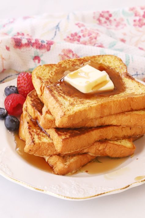 This Classic French Toast Recipe is light, fluffy, and super simple. Lightly sweetened, with just a hint of cinnamon and nutmeg, this accompanies just about any breakfast dish. It tastes great, served solo with maple syrup or with fresh fruit and whipped cream. #thecarefreekitchen #frenchtoast #breakfast #brunch #classic French Toast Sandwich Breakfast, French Toast With Sandwich Bread, French Toast Recipe With Flour, French Toast Recipe For 2, Simple French Toast, French Toast Recipe Easy, Cinnamon French Toast Recipe, Simple French Toast Recipe, Sweet Toast