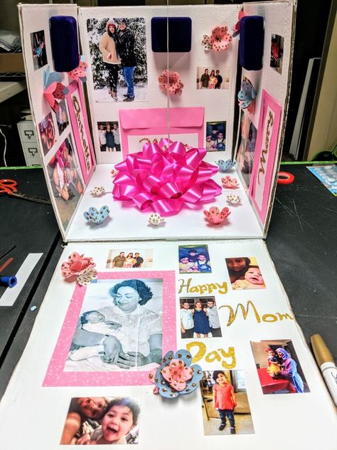 Mother's Day Reveal Box with LED lights at the base of the box, music and helium balloons. This box features my mother's mother, my mother, sister and sister in law with their babies. This is very special and personal to me as I cannot see my family this year to celebrate this occasion, I made this with so much love. #mothersday #box #surprise #reveal #gift #uniquegift #pink #flowers #glitter #specialoccasion Open Me Box Surprise, Big Explosion Box With Balloons, Big Sister Birthday Gift Ideas, Quince Surprise Gift Ideas, Surprise Balloon Box Ideas, Diy Mother In Law Gift Ideas, Surprise Gift Box Ideas Quinceanera, Quince Surprise Gift, Balloon Box Surprise