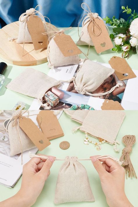 13.5x9.5 cm Beige Burlap Packing Pouches Jewelry Pouches Gift Wrapping Bags with Kraft Gift Tags Jute Cord for Christmas Wedding Party Favors. Sign up to get a total of $15 #coupons! #PandaHall #PandaHallSelectedapp #pandahallselected #NBEADS #Gift #jewelrymaking #Bags #handmake #Drawstring #simple #DIY #mode #jewelryaddict Christmas Wedding Party, Burlap Bags, Jewelry Pouches, Paper Gift Tags, Favors Sign, Small Gift Bags, Wedding Party Favors, Jute Bags, Simple Bags