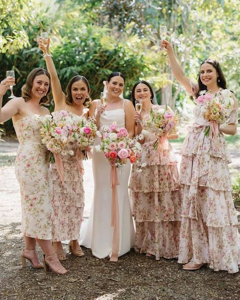 🌸 Floral bridesmaids dresses are so FAB 🌸 Watercolour, paisley, ditsy or bold, there are so many ways to work your florals! 🌼 💐 Click the link in our bio for 50+ beautiful bloom bridesmaids dresses: https://onefabday.com/floral-bridesmaids-dresses/ Photo 1: 👗 & 📸 by @vchapmanstudio Photo 2: 📸 by @davidabel.co Photo 3: 👗 by @maidstomeasure 📸 by @michellepruntyphotography Photo 4: 📸 by @jessaschifilliti Photo 5: 👗 by @staud.clothing, @acler, @revolve 📸 by @samanthariles.weddings Photo 6... Floral Bridesmaid Dresses Mismatched, Bridesmaid Dresses Floral Print, Matching Bridesmaids Dresses, Floral Bridesmaids, Romantic Bridesmaid Dresses, Light Blue Bridesmaid Dresses, Printed Bridesmaid Dresses, Floral Print Gowns, Princess Bridesmaid Dress