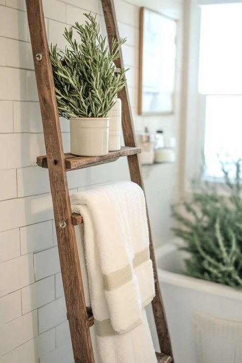 "Add vintage charm to your bathroom with a DIY Vintage Ladder Towel Rack! 🛠️🚿 This project is perfect for repurposing old ladders into stylish and functional towel storage. 🌟✨ #VintageDecor #TowelRack #DIYProjects" Wooden Towel Ladder Bathroom, Bamboo Towel Ladder, Ladder In Bathroom, Old Ladders Repurposed, Towel Ladder Bathroom, Vintage Ladder Decor, Old Ladder Decor, Bathroom Towel Rack Ideas, Diy Towel Rack