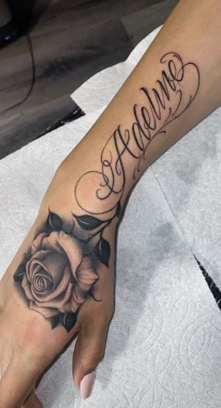 Best Forearm Tattoos Women, Zen Tattoos For Women, Lightly Shaded Rose Tattoo, Ray Name Tattoo, Forearm Tattoo Women Names, Forearm Name Tattoo Women, Rose Tattoo With Name Forearm, Last Name Forearm Tattoo, Women Tattoos Forearm