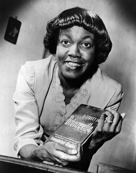 Gwendolyn Brooks poses with her first book of poems, A Street in Bronzeville. Gwendolyn Brooks, African American Writers, Aesthetic Writing, Famous Writers, African American History Facts, Black Writers, Book Of Poems, Black Authors, American Poets