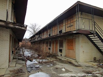 The abandoned Vail Apartments in Harvey, Illinois Apocalyptic Buildings, Abandoned Apartment, Design Intervention, Story Development, Fallout Rpg, Abandoned Village, Abandoned Town, Forest Cottage, Abandoned Homes