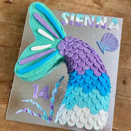 Easy Mermaid Cake Ideas for Your Girls Birthday - Cake 2 The Rescue Mermaid Tail Shaped Cake, Diy Ariel Cake, Mermaid Birthday Cake Ideas Diy, Easy Mermaid Cake Diy, Mermaid Tail Cake Ideas, Easy Mermaid Birthday Cake, Mermaid Shaped Cake, Mermaid 3rd Birthday Cake, Homemade Mermaid Cake