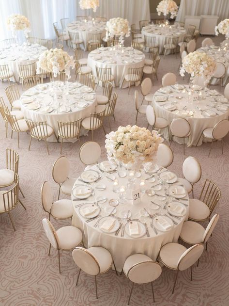 Looking for inspiration for your white wedding reception? This pin features beautiful table decor at the iconic Beverly Hills Hotel. From simple centerpieces to stunning place settings, this pin has it all! Simple White Wedding Reception, Wedding Decor Restaurant, Banquet Hall Wedding Decor, Wedding Restaurant Decoration, White Decor Wedding, Cherry Blossom Wedding Theme, White Wedding Reception, Round Wedding Tables, Wedding Restaurant