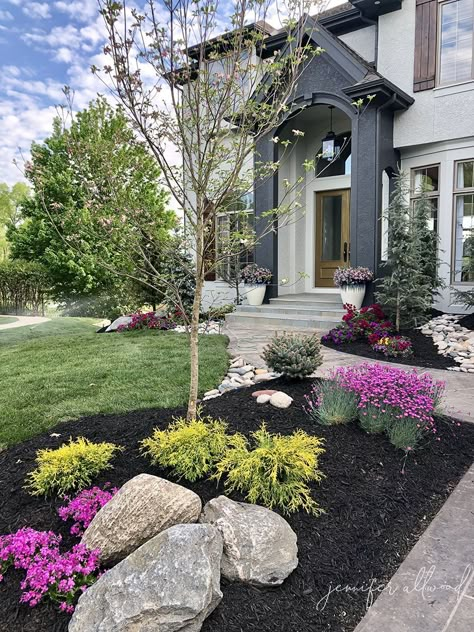 As a busy family of 6, (who am I kidding?!?! even when I DIDN’T have kids)… It was just super important to me that our landscaping be A: Colorful because I love color and B: Super easy to maintain. Let’s face it: I tend to kill EVERYTHING. lol. So, we asked Randy Kitch from Kitch’s … Jennifer Allwood, Landscaping With Boulders, Backyard Kitchen, Easy Landscaping, Front Landscaping, Front House Landscaping, Landscape Plans, Home Landscaping, Garage Ideas