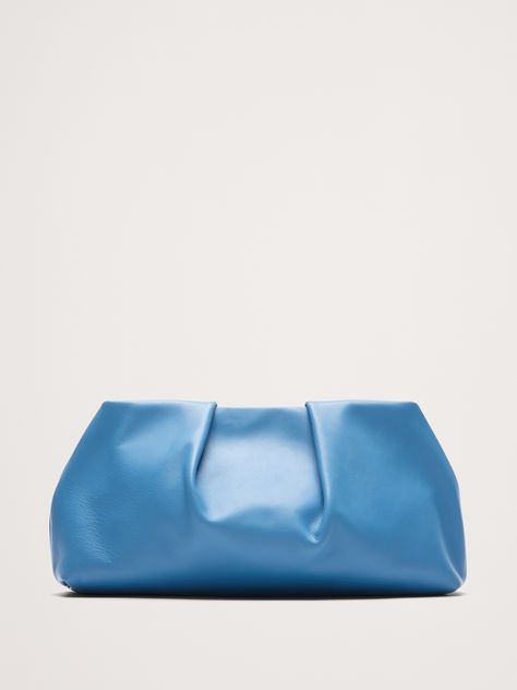 We designed this cloud-shaped clutch to carry you through every occasion for years to come, crafted here from beautiful leather to emphasize a distinctive pleated construction.  Magnetic clasp closure.  Fully lined.  Height: 6. 3" Width (base): 12. 8" Width (top): 10. 5" Depth: 2. 75" Woolen Tights, Dressy Hats, T Bar Shoes, Burgundy Style, Blue Clutch, Chic Fall Outfits, Black Pantyhose, Faux Leather Belts, Family Event