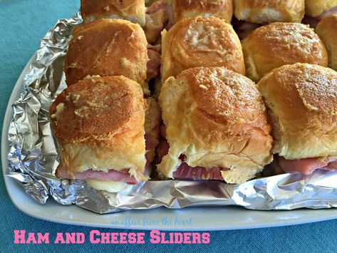 Ham and Swiss cheese, loaded on King's Hawaiian rolls, slathered with a Dijon butter, and baked in the oven. Great for company or tailgates! Boating Food Ideas Summer, Dijon Butter, Easy Baked Beans Recipe, Lake Snacks, Hawaiian Bread Rolls, Beach Party Food, Simple Baked Beans Recipe, Boat Snacks, Ham And Cheese Sliders