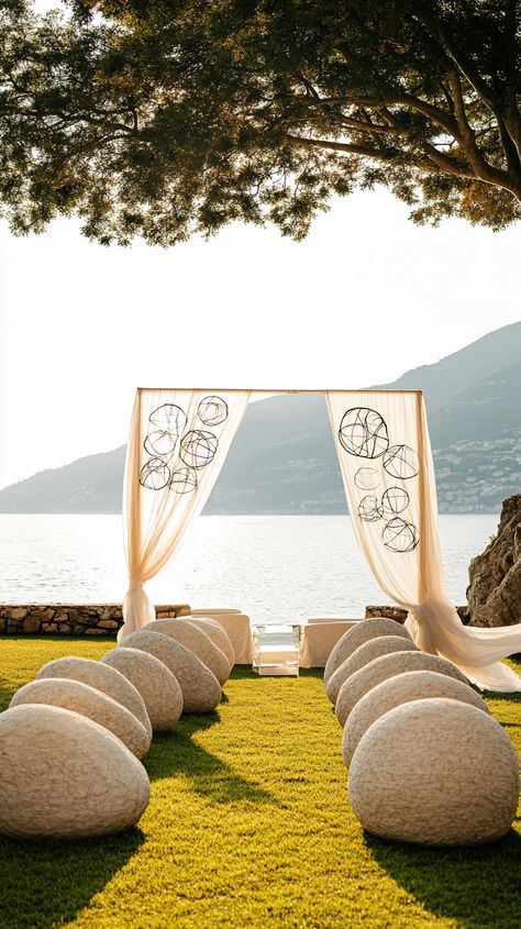 Immerse yourself in a modern outdoor wedding ceremony in Donostia! Picture the elegant arch, minimalist sculptures, and stunning Celtic symbols, all set against nature's beauty. Say "I do" in style! #Midjourney #WeddingInspiration #OutdoorCeremony #DonostiaVideographer Modern Outdoor Wedding, Ultimate Playlist, Barcelona Wedding, Wedding Spain, Beautiful Perfume, Love Film, Celtic Symbols, Outdoor Wedding Ceremony, Wedding Videographer