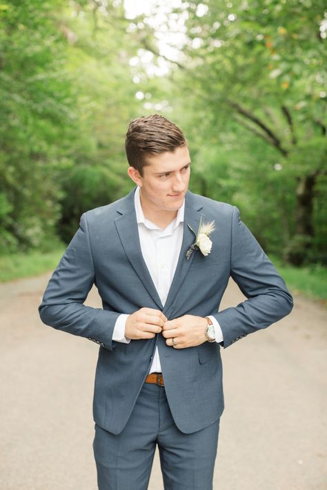 groom in dusty blue suit  #wedding #weddingshoes #weddingday #marryingmybestfriend #weddingfashion #bridestyle #sayido #weddingflowers #weddingarrangements #weddinginspo #weddinginpiration #engagemnetrings #weddingphotography #engaged Groom In Colored Suit, Dusty Blue Wedding Men, Grey Blue Suit Wedding, Groom Attire Dusty Blue, Dusty Blue Groom Suit, Slate Blue Groomsmen Attire, Dusty Blue Wedding Suit, Dusty Blue Suit Groom, Dusty Blue Groom