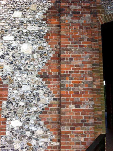 Zig zag brick pier in flint wall Flint Wall, Brick Wall Construction, River Shoals Brick, Brick And Flint Garden Wall, Organic Brick Architecture, Brick Relief Facade, Bluestone Paving, Brick Projects, Architecture Sketchbook