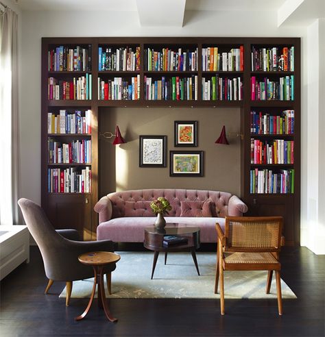 Damon Liss carved this cozy, intimate library nook out of a larger, loft-like space in Tribeca, New York City. The light-filled corner includes armchairs by Kerstin Horlin Holmquist and Pierre Jeanneret, as well as a Martin Eisler coffee table purchased from Espasso. Mid Century Modern Living Room Design, Home Library Rooms, Home Library Design, Mid Century Modern Living, Mid Century Modern Living Room, Small Room Design, Home Libraries, Family Room Design, Home Library