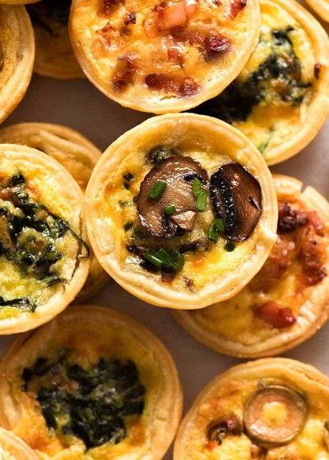 Overhead photo of mini quiches, ready to be eaten Veg Platter Ideas, Savoury Canapes, Savoury Pastry, Mini Quiche Recipes, Mini Pie Recipes, Cottagecore Food, Canapes Recipes, Pastry Cook, Mini Appetizers