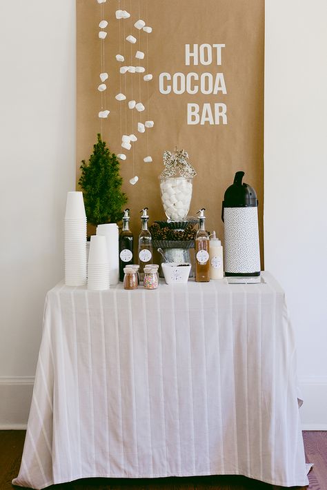 Make your own DIY hot chocolate bar Hot Chocolate Bar For Party, Outdoor Hot Cocoa Bar Ideas, Hot Chocolate Bar Outdoor, Boho Hot Chocolate Bar, Hot Chocolate Bar Birthday Party, Hot Coco Baby Shower Bar, Hot Chocolate Theme Party, Winter Onederland Party Decor, Hot Toddy Bar