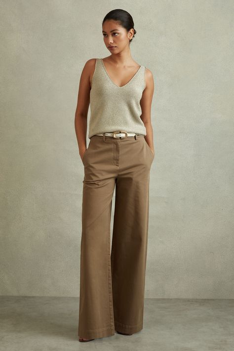 Find REISS Eva Petite Cotton Blend Wide Leg Trousers on Editorialist. The Eva trousers have a wide-leg finish that fit relaxed through the thighs, starting mid-rise on the hips. Their cotton blend fabric offers technical stretch and a soft cargo feel. Cotton blend. Side pockets. Wide leg Wide Legged High Waisted Pants, Travel Trousers Women, Shoes For Cropped Wide Leg Pants, White Wide Leg Pants Outfit Dressy, 40 Style Woman, How To Wear Wide Leg Pants Casual, Womens Trousers Outfits, How To Dress In Your 40's For Women, Spring Essentials Wardrobe