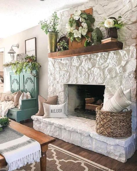 15 Fresh And Inviting Ideas For Infusing Spring Into Your Home Fireplace Hearth Decor, Stone Fireplace Decor, Painted Stone Fireplace, White Stone Fireplaces, Hearth Decor, Rustic Stone Fireplace, Stone Fireplace Makeover, Home Gym Garage, Fireplace Mantle Decor